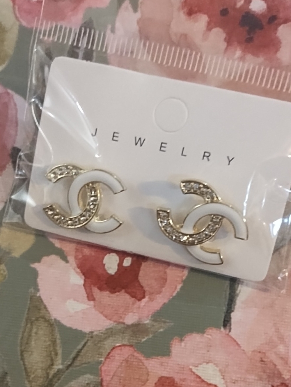 White and Gold Tone Interlocking Logo Earrings - Jewelry